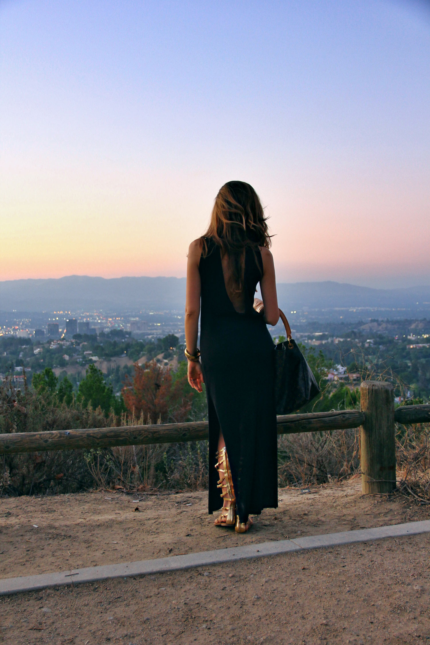 Black Maxi Dress with Gladiator Sandals and Louis Vuitton Handbag