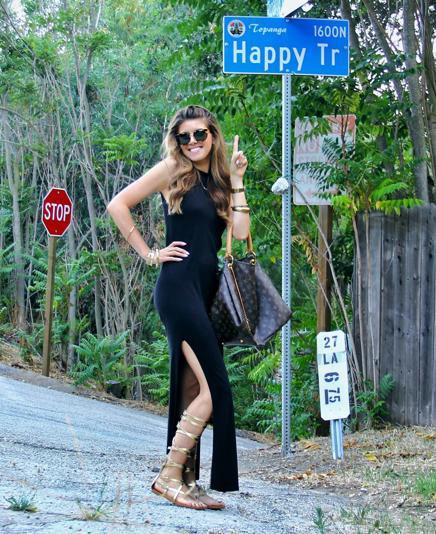 Black Maxi Dress with Gladiator Sandals and Louis Vuitton Handbag