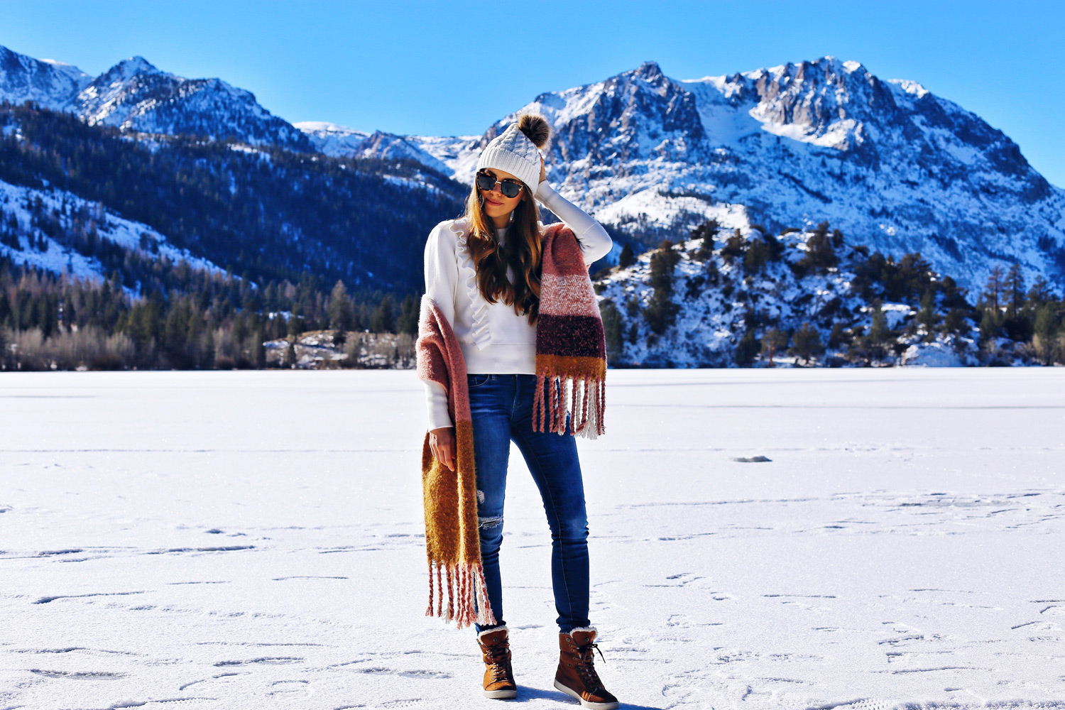 Fashion and lifestyle blogger Adelina Perrin of The Charming Olive wearing Chicwish scarf, Zara ruffled top, Amazon beanie and Payless Shoes